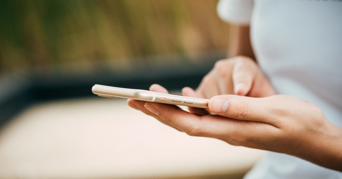 Person searching on their mobile phone