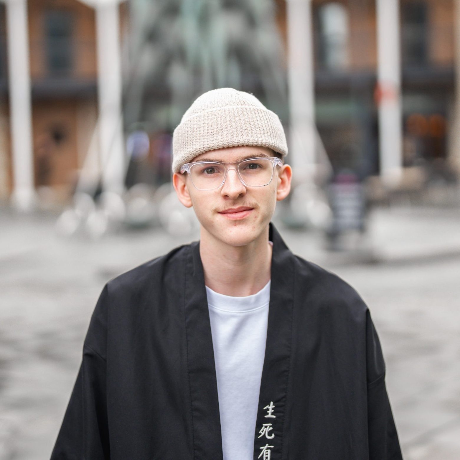 Headshot of harry phillips from the wonder agency stood outside