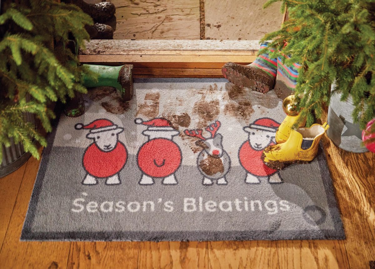 Christmas herdy washable doormat at front door