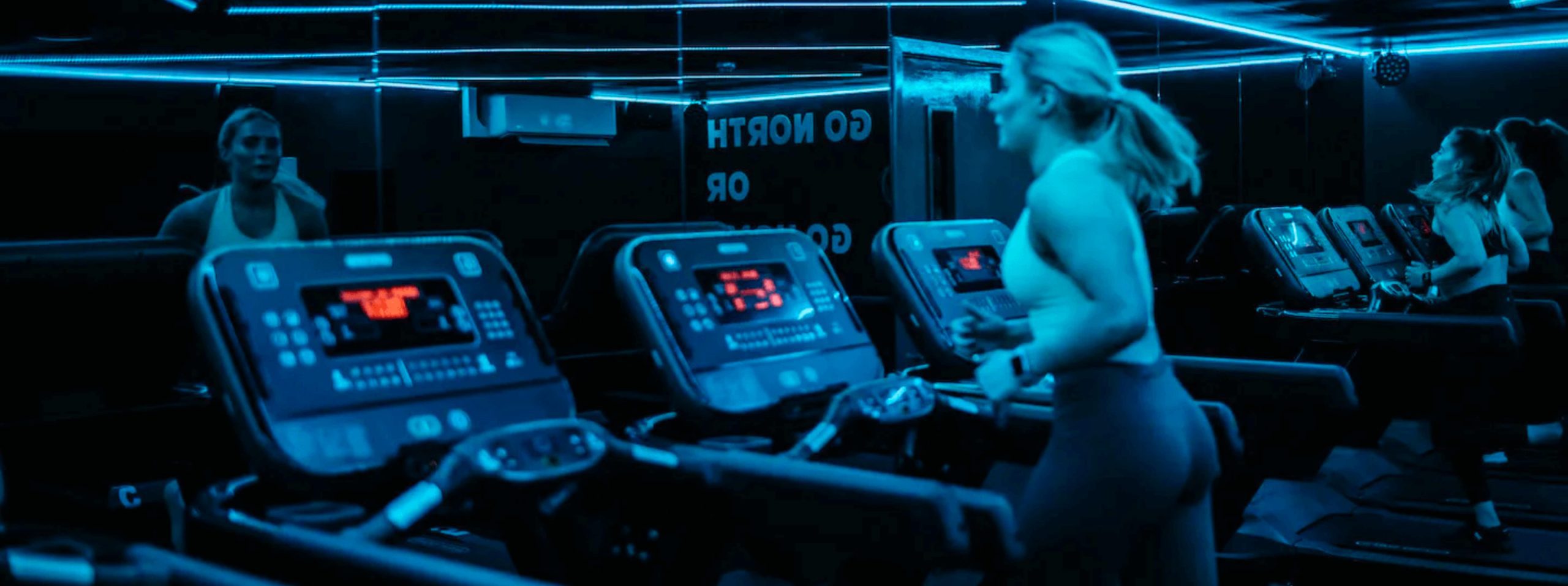 a woman running on a treadmill at north studio leeds