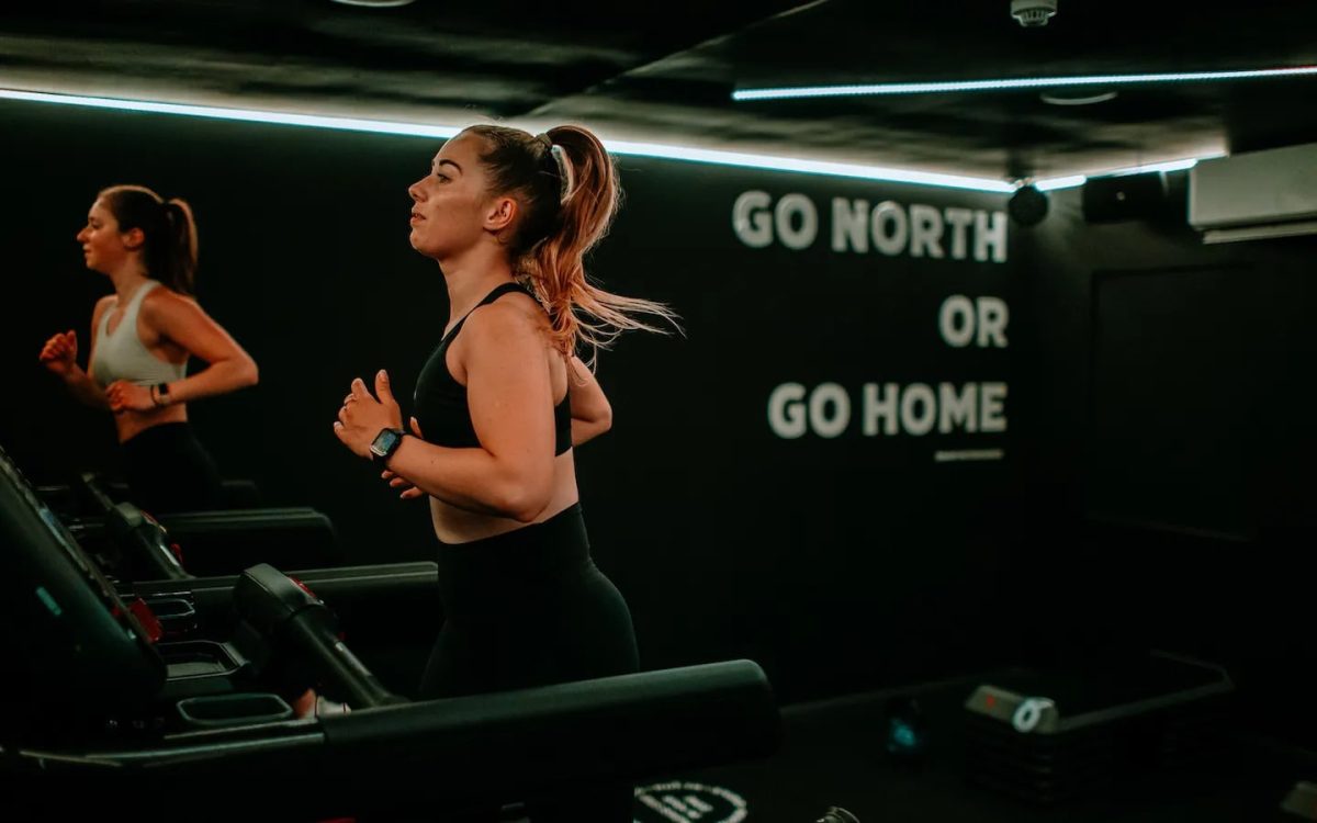 women running on a treadmill in north studio