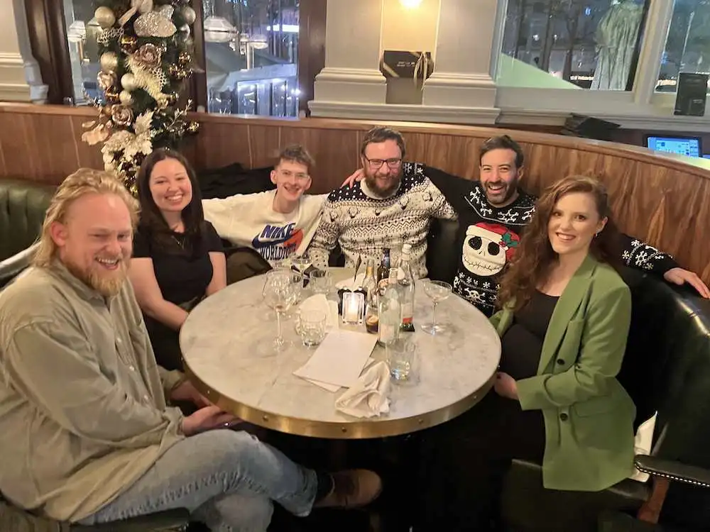 A team photo of the wonder agency out for a meal