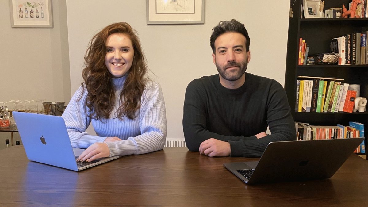 Amy and Steve the directors of Wonder sat at a table with laptops