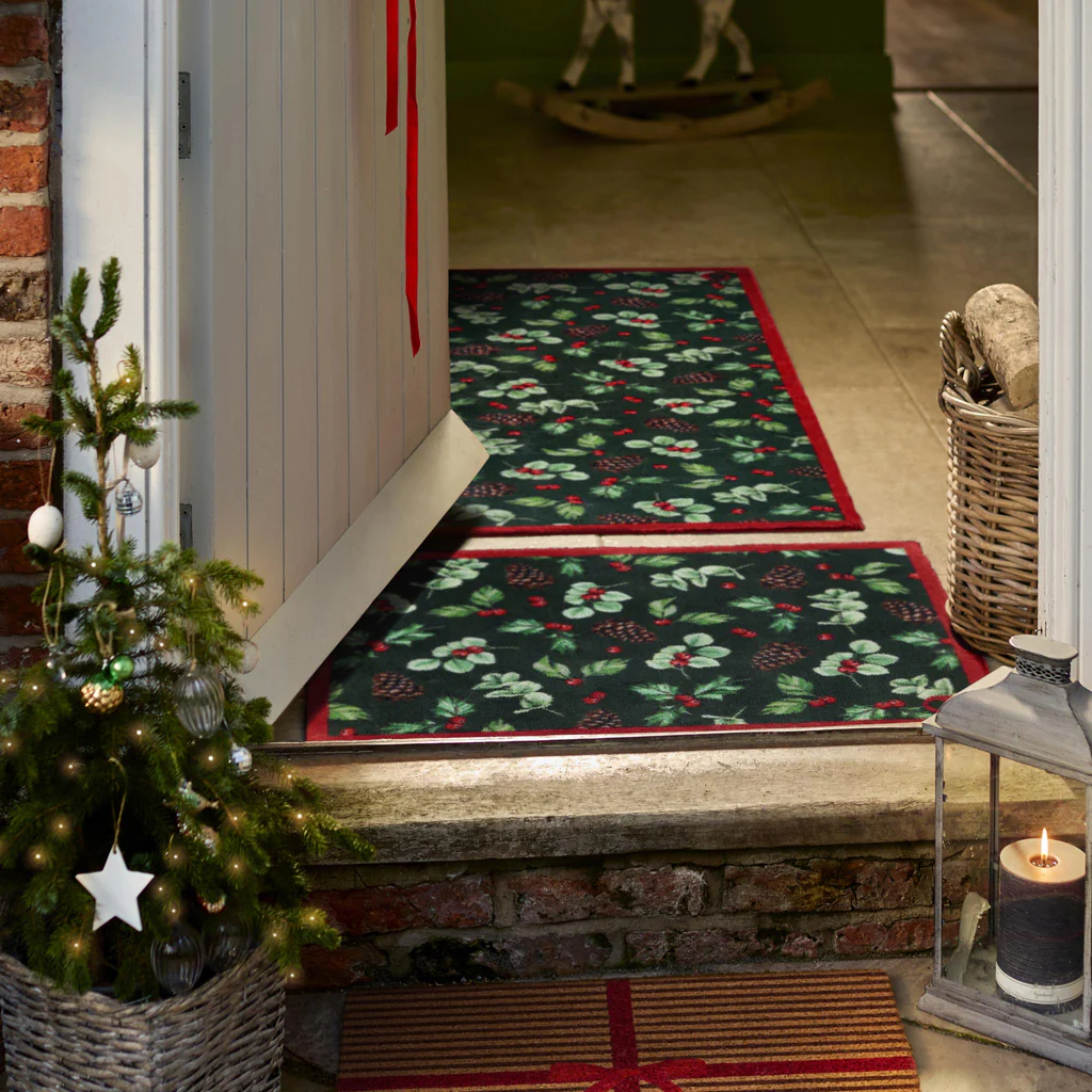 A winter berries front doormat and runner, featured on a case study on Wonder Agency's custom advent calendar build for Hug Rug