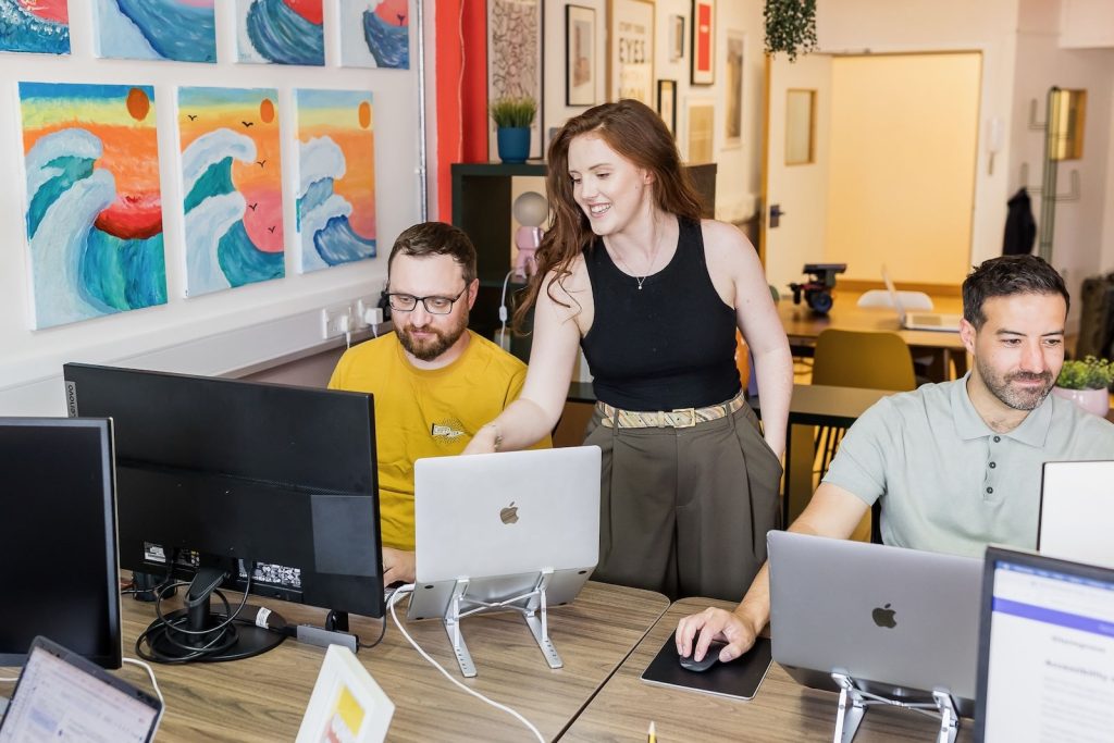 wonder agency team discussing website development solutions